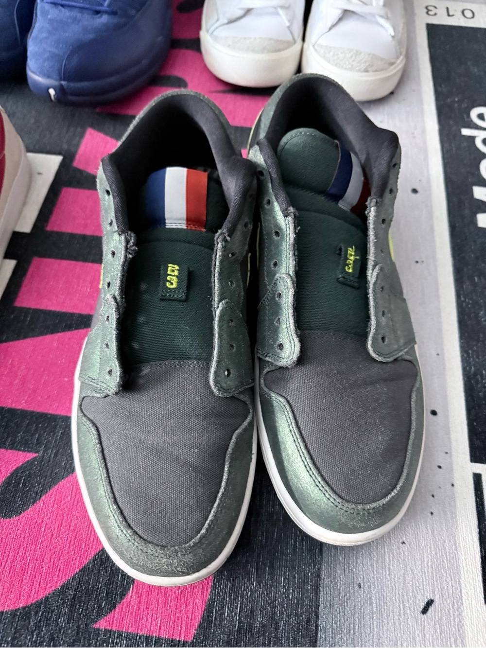 Jordan 1 Low SE in Metallic Green with Black Accents